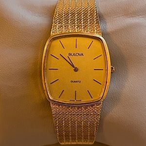 Men’s Bulova Gold tone quartz watch.